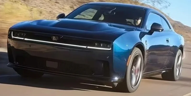 a 2025 Dodge Charger driving down the road.