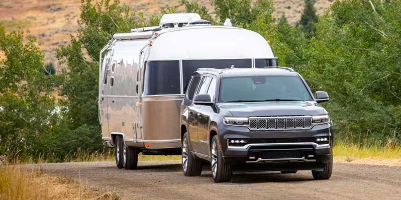 2025 Grand Wagoneer towing a camper.