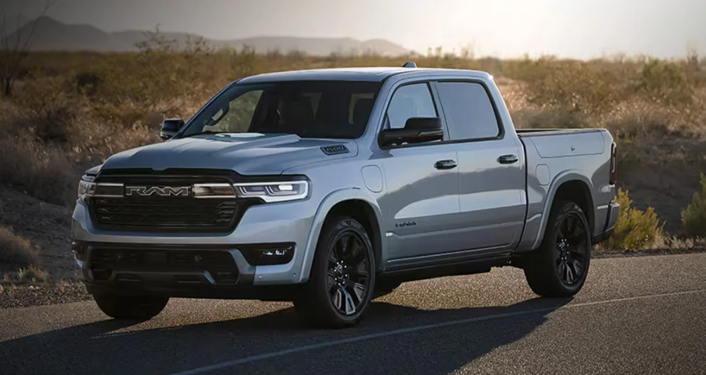 A 2026 RAM 1500 driving down the road.