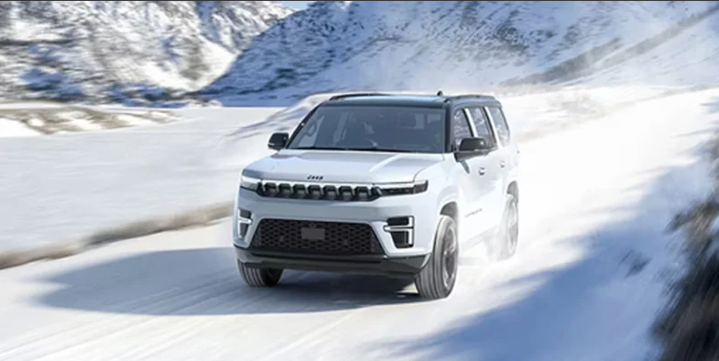 A photo of a white 2026 Jeep Grand Wagoneer driving down a snow covered road.